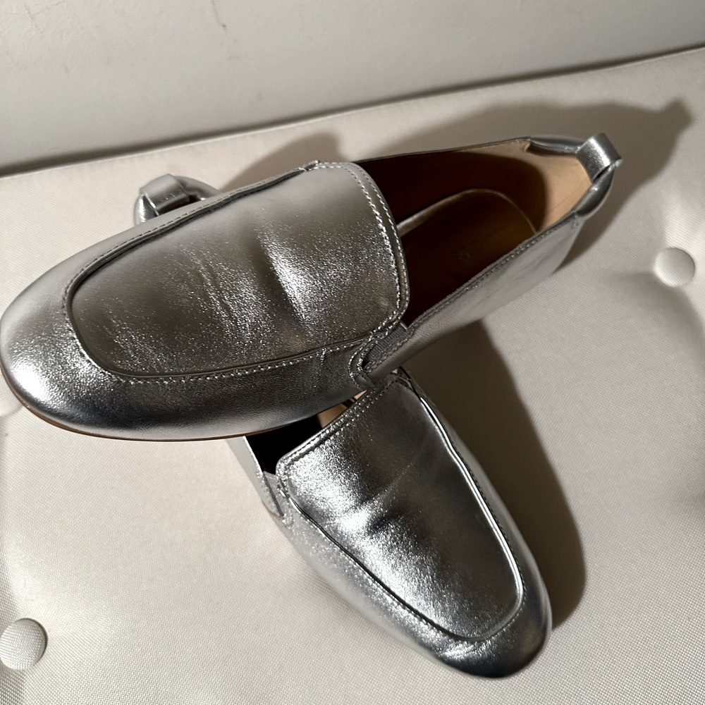 Never worn, silver Mocs.